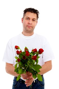 Handsome man is giving bouquet of roses over white background