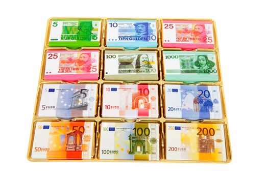 Chocolate Dutch currency in box over white background
