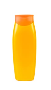 Yellow blank shampoo bottle over white background