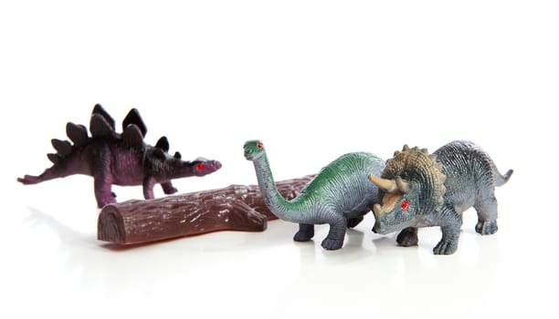 plastic dinosaur toys isolated on white background 
