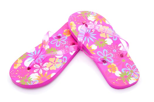 pink colored summer slippers isolated on white background