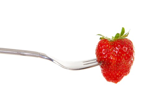 Fork with fresh strawberie over white background