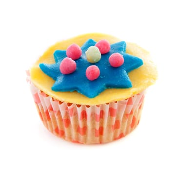 cupcake with marzipan decoration over white background
