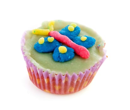 cupcake with marzipan decoration over white background