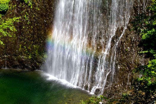 Rainbow in waterfall of Ray-Pic in France