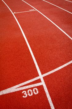 Track lanes ins sports runway, red surface