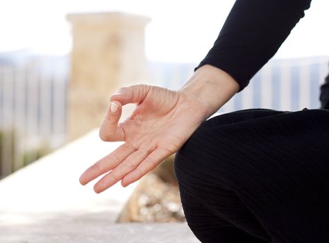 Close up of a hand gyan mudra position