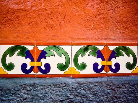 Details of Mexican color tiles on exterior of building