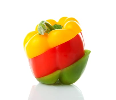 Paprika made out of mixed colorful slices over white background