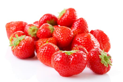 Couple of fresh strawberries in closeup over white background
