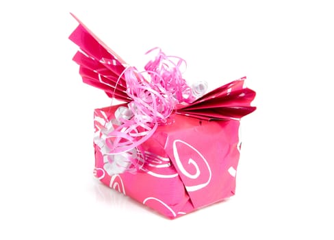 Beautiful wrapped gift for birthday or valentine's day over white background