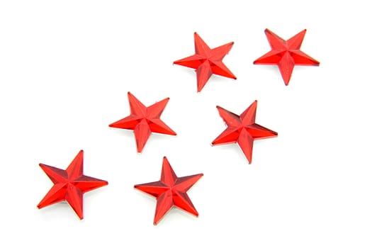 Red stars confetti over white background