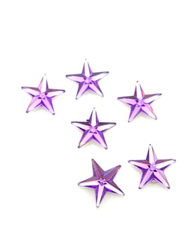 Purple stars confetti over white background