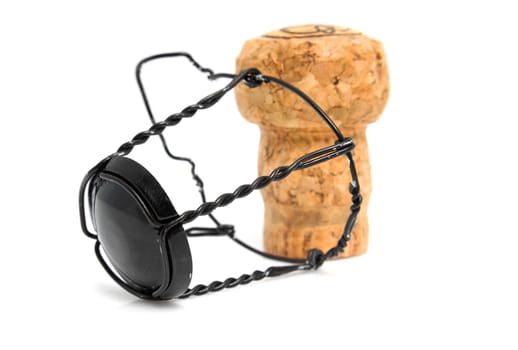 Champagne cork in closeup over white background