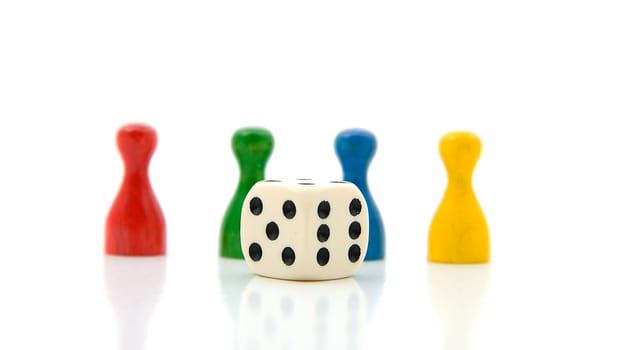 four colorful pawns with white dice over white background