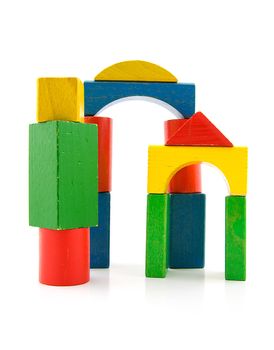 colorful woorden building blocks over white background