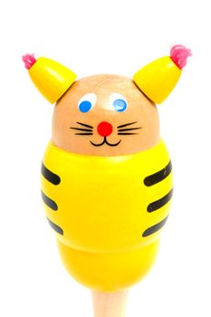 wooden children's music rattle over white background