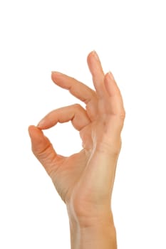 Woman's hand making OK sign over white background