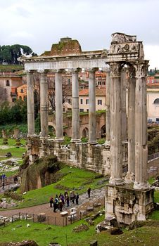 view over ruins: temple of Saturn in Roman Forum, Romanum, in Italy