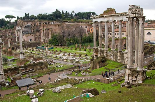 view over ruins: temple of Saturn in Roman Forum, Romanum, in Italy