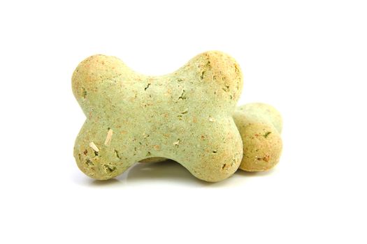 Green dog cookies isolated on white background