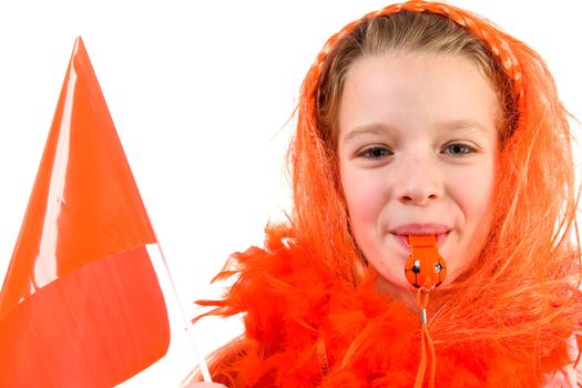 Girl is posing in orange outfit for soccer game over white background