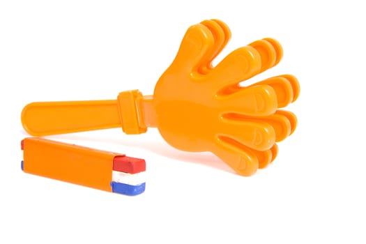 Orange accessories for Dutch soccer game over white background