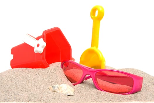 beach stuff on sand over white background