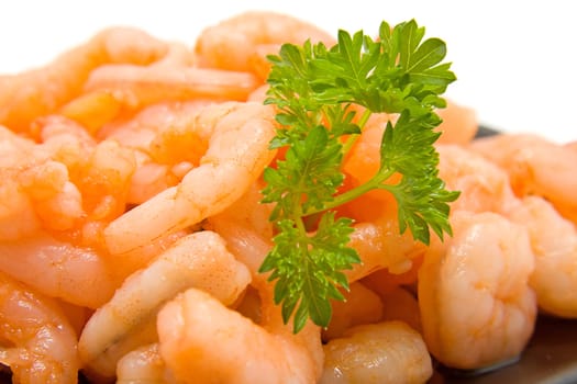 fresh raw orange shrimp in closeup over white background