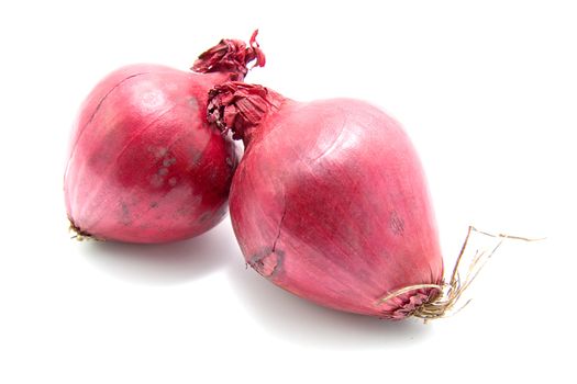 two red onions isolated on white background