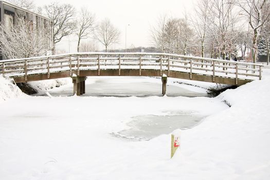 Bridge with snow, it is winter in Holland