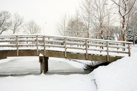 Bridge with snow, it is winter in Holland