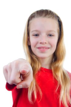 Girl is pointing at you over white background, girl is blur and hand is sharp