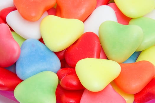 Background of colorful hearts candy in closeup