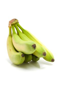 Spray of fresh green bananas isolated on white background