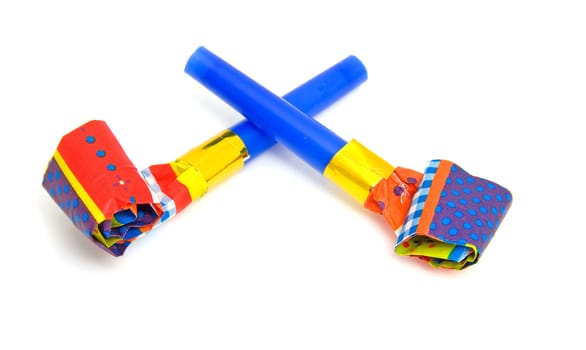 Two colorful birthday horns isolated on white background