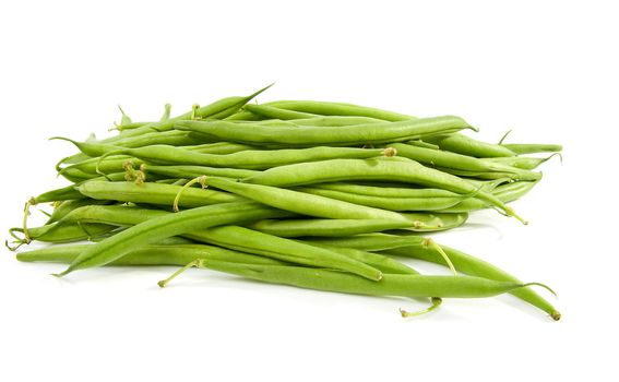 Pile of raw green long beans over white background