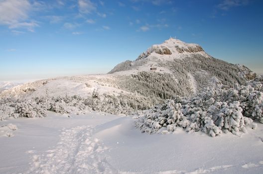 Mountain top in winter, Ceahlau mountains in Romania