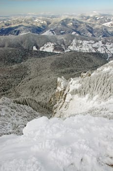 Snow mountains, view from the top of Ceahlau mountains
