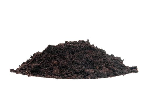 Pile of black garden top soil over white background