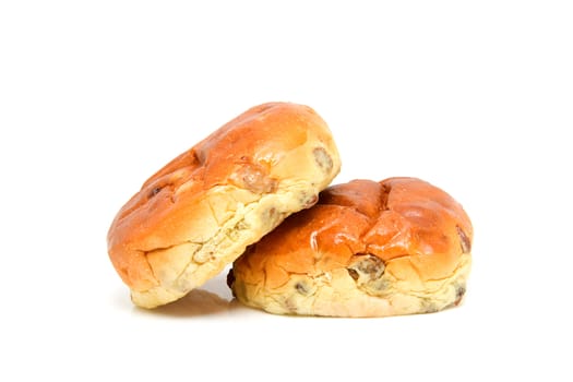 Two raising bread also known as Dutch krentenbol, isolated on white background