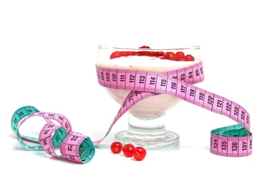 glass bowl with yogurt,berrie fruit and measure tape for dieting over white background