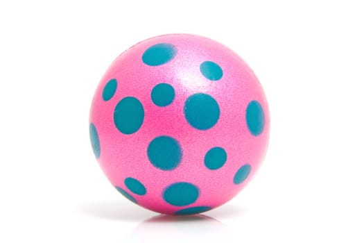 Pink dotted ball isolated on white background