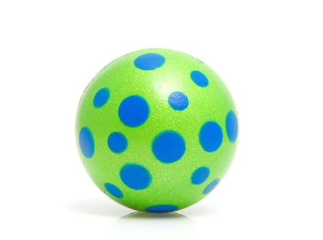 Green ball with blue dots isolated on white background
