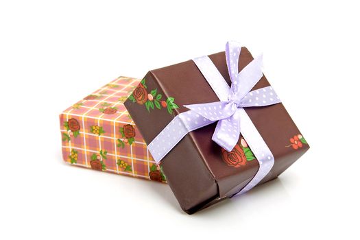 Two birthday presents isolated on white background