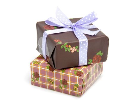 Pile of birthday presents over white background