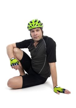Cyclist in closeup posing over white background