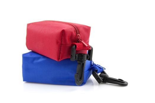 Little traveling bags isolated on white background
