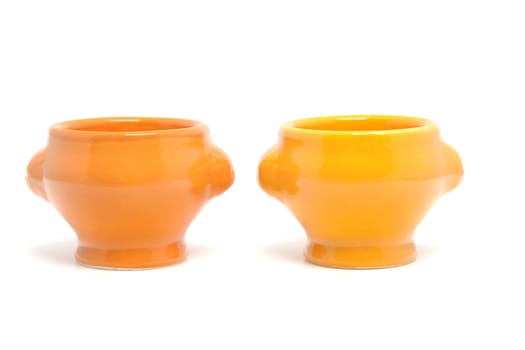Two orange egg container bowls isolated on white background