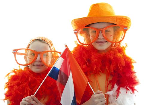 Two girls posing in orange outfit for soccer game or Dutch Queensday over white background
